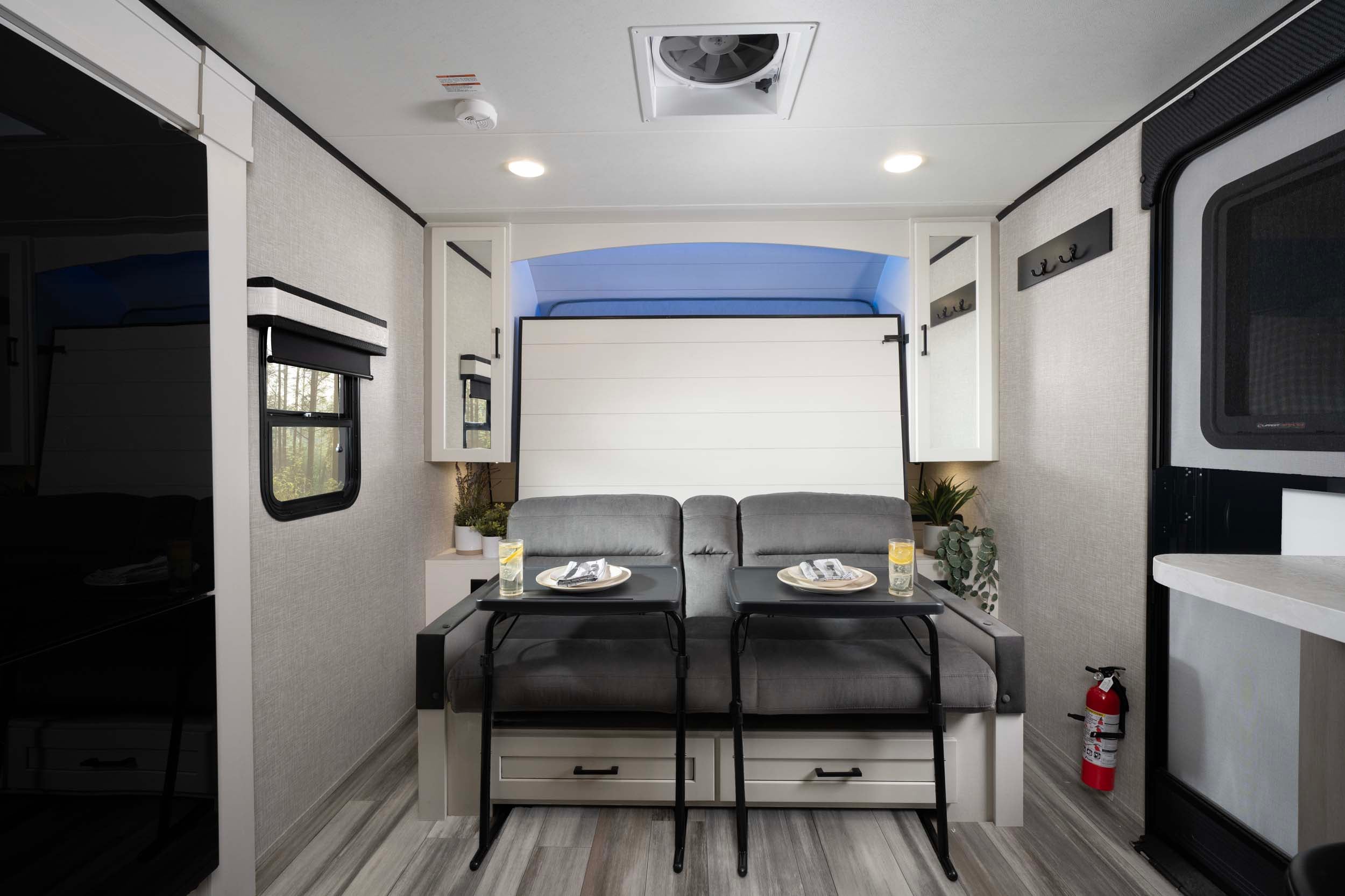 Custom RV interior with a bed in the up position