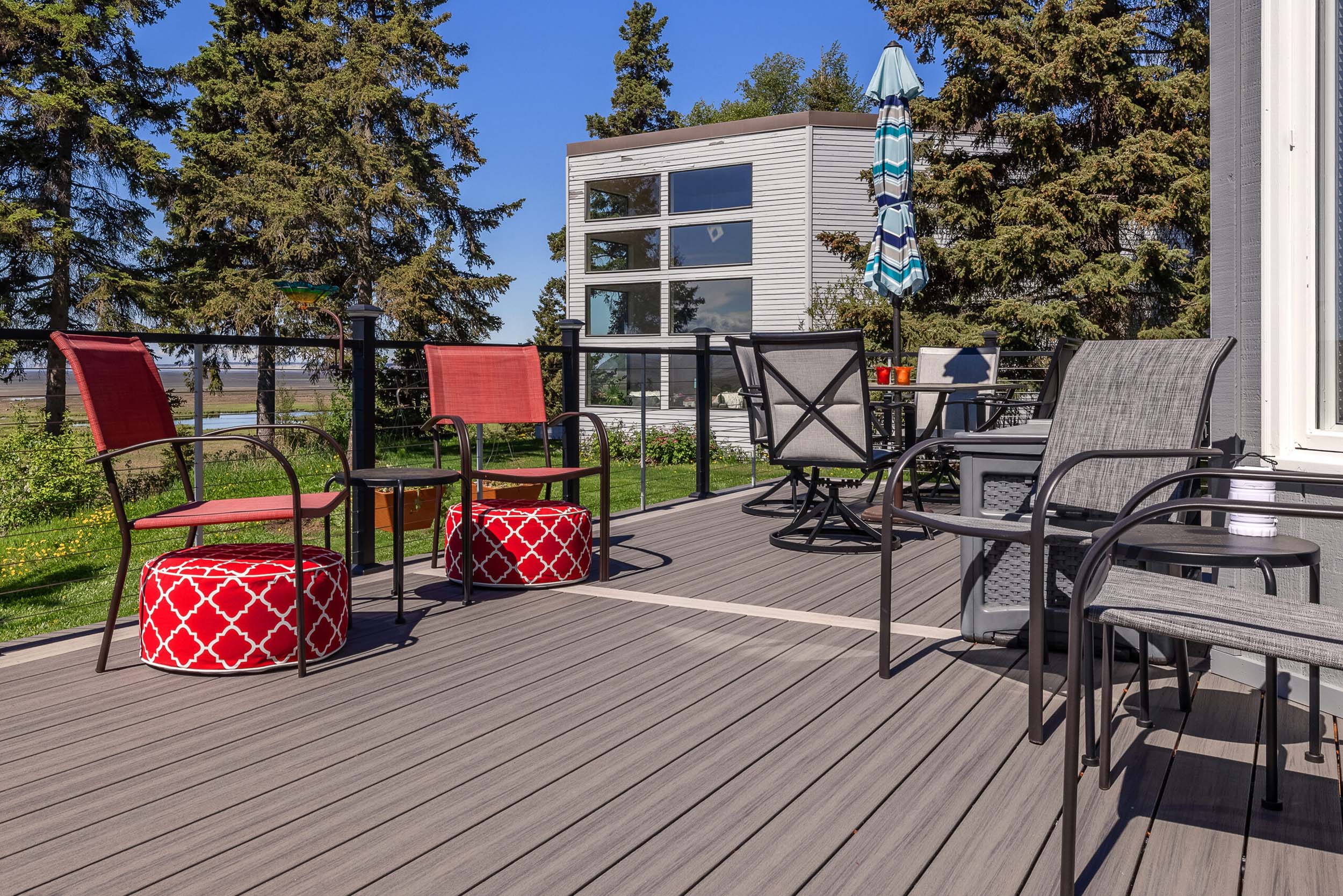 Composite decking installation on modular building exterior