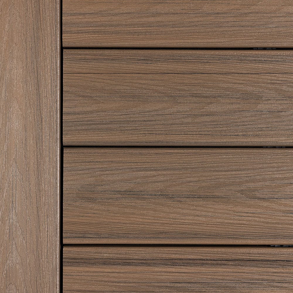 Deckorators Venture composite decking boards installed in Sandbar color