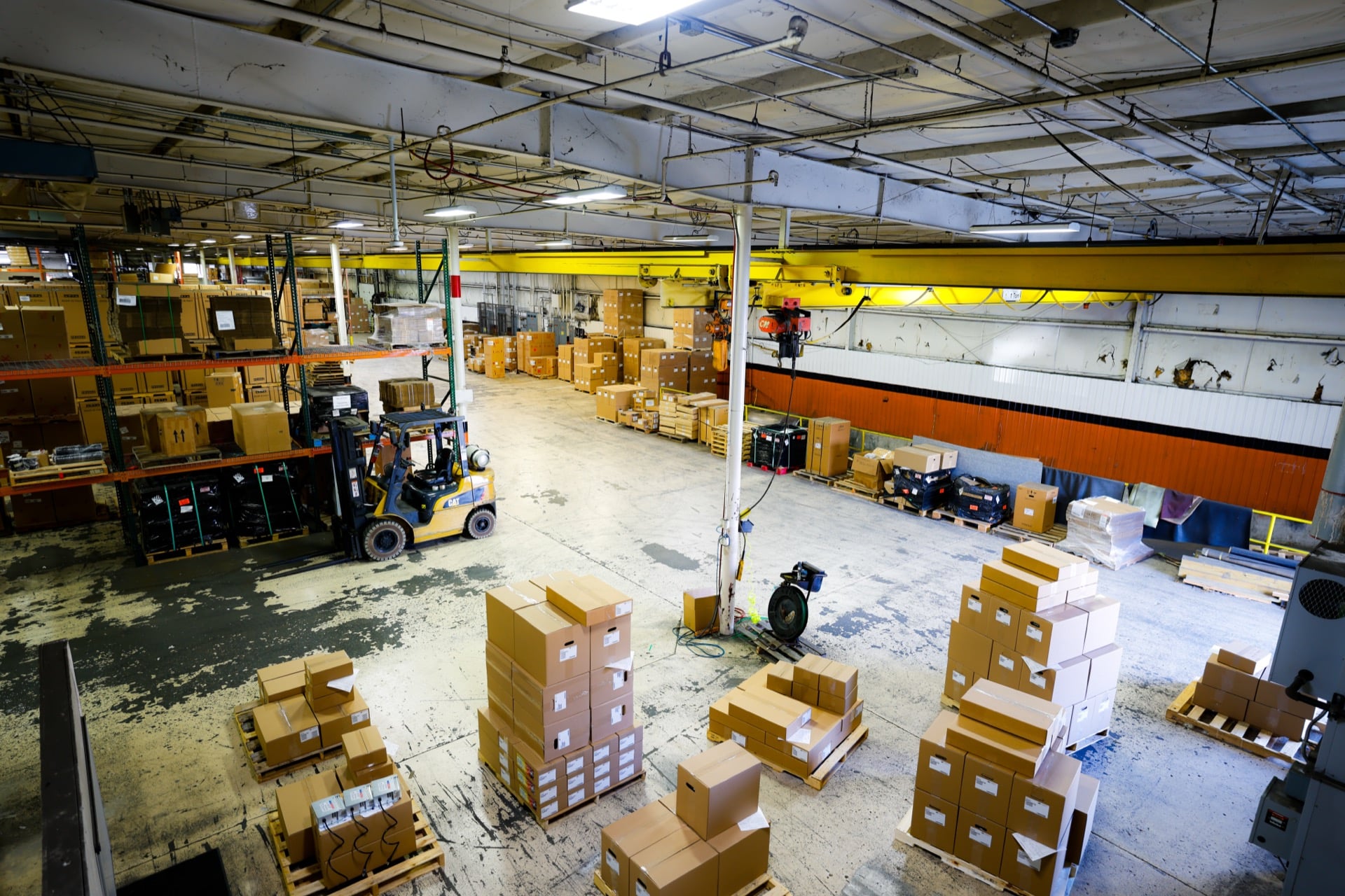 UFP Distribution warehouse with forklift and stacked inventory