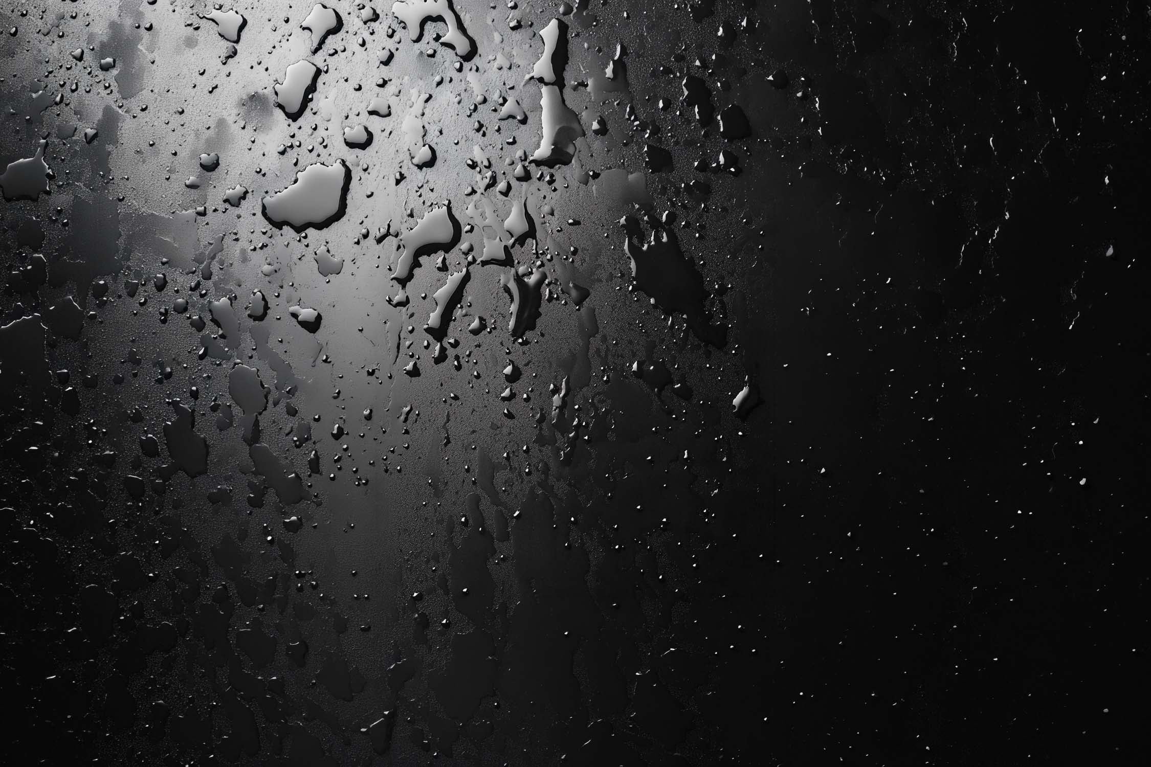 Water beading on a dark Supersede Marine Board surface