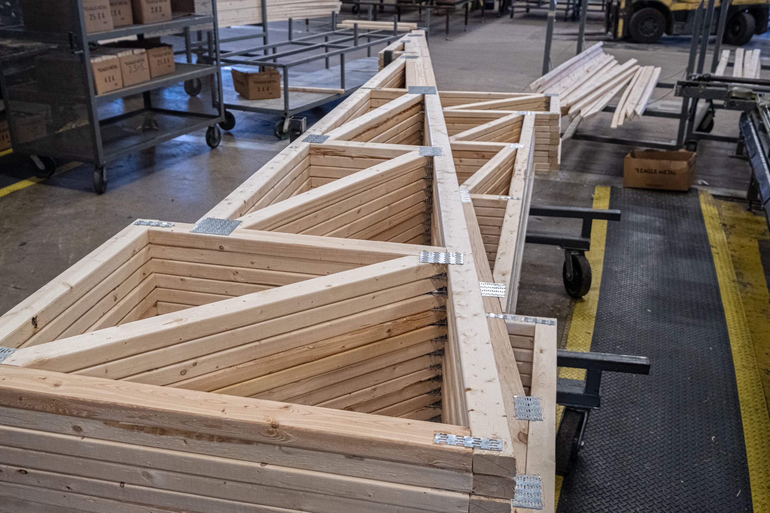 Commercial roof trusses staged for installation